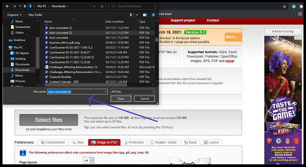Select images and hit Open